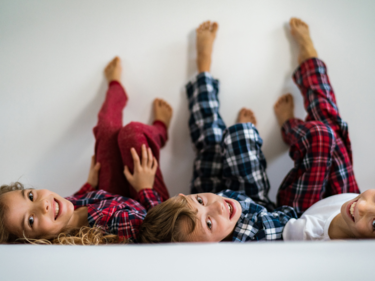 3 kids wearing pajamas