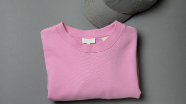 Pink shirt with a grey background